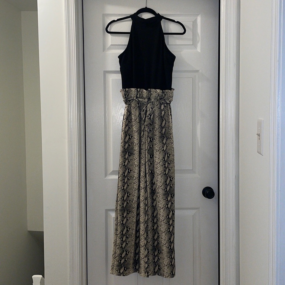 Francesca’s black and snakeskin pantsuit